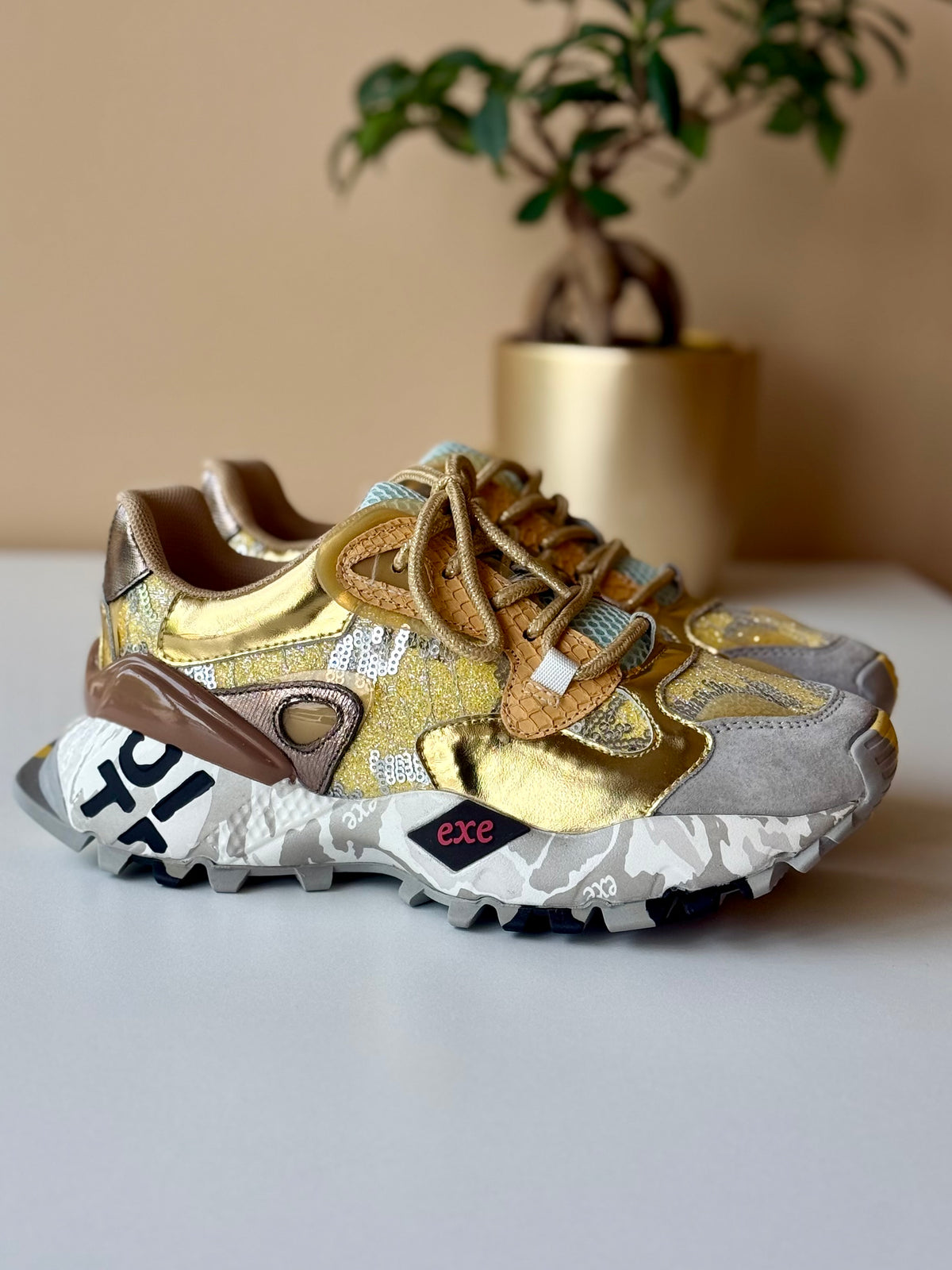 Exé Gold Snake Lea Sneakers